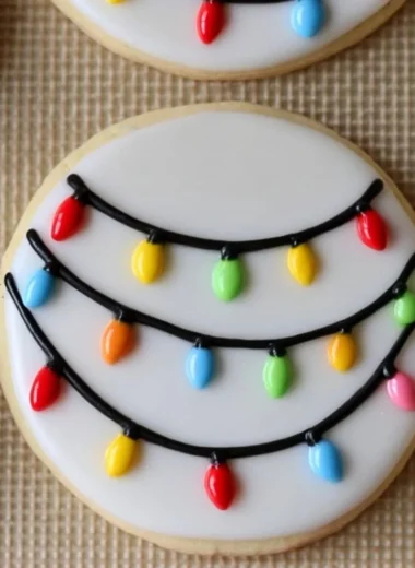 Christmas Lights Royal Icing Sugar Cookies decorated with vibrant icing.