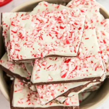 Homemade cozy peppermint bark made with chocolate and crushed candy canes.