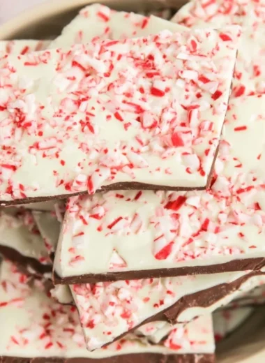 Homemade cozy peppermint bark made with chocolate and crushed candy canes.