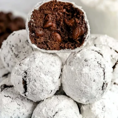 Double chocolate snowball cookies dusted with powdered sugar, ready to enjoy.