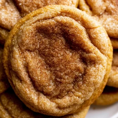 Deliciously spiced Pumpkin Snickerdoodle Cookies on a plate