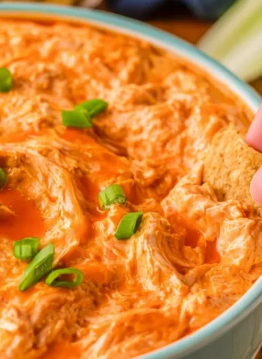 Delicious Buffalo Chicken Dip served with tortilla chips at a party