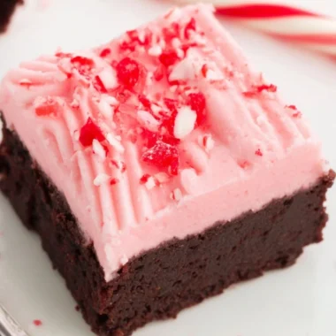 Decadent Candy Cane Brownies decorated with crushed candy canes for Christmas