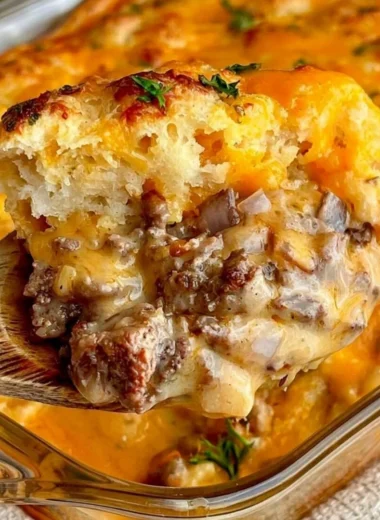 Cheddar Bay Ground Beef Cobbler casserole with a creamy and cheesy topping
