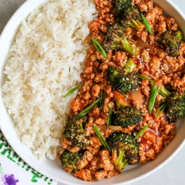 Spicy Firecracker Ground Chicken dish served with vegetables on a plate.