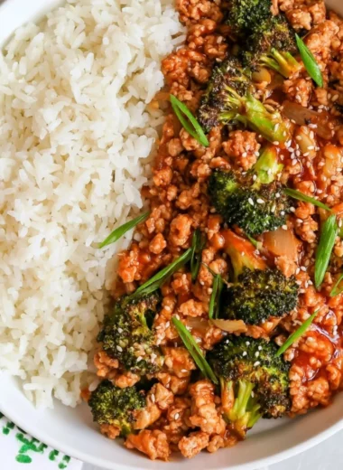 Spicy Firecracker Ground Chicken dish served with vegetables on a plate.
