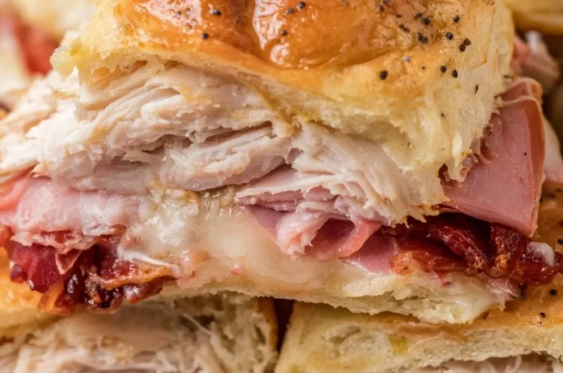 Buttery baked club sliders on a platter, ready to serve for any occasion