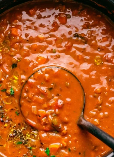 Bowl of Mediterranean Lentil Soup garnished with herbs and spices