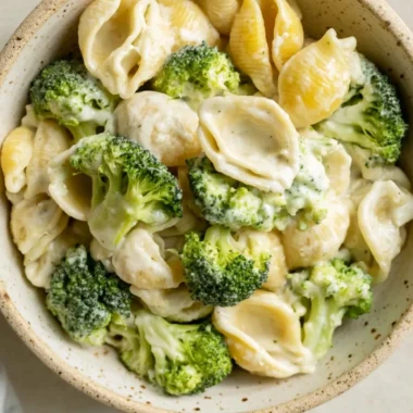 One Pot Broccoli Pasta served in a bowl with a sprinkle of parmesan