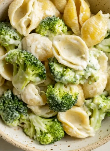 One Pot Broccoli Pasta served in a bowl with a sprinkle of parmesan