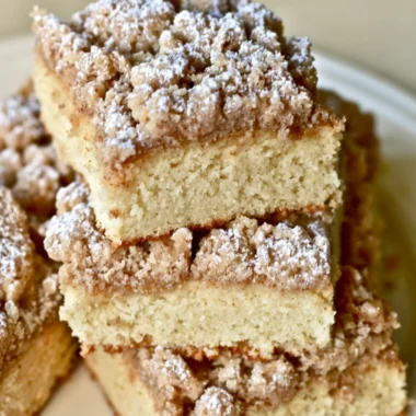 Delicious slice of New York Crumb Cake with a rich crumb topping
