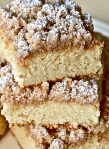 Delicious slice of New York Crumb Cake with a rich crumb topping